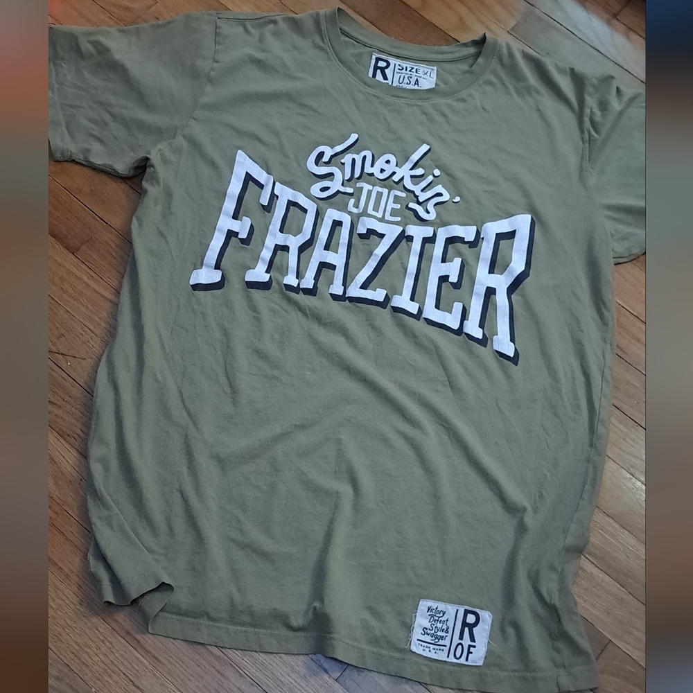 Roots of Fight Sports Boxing Legend Smokin Joe Frazier Olive Green Graphic Tee.